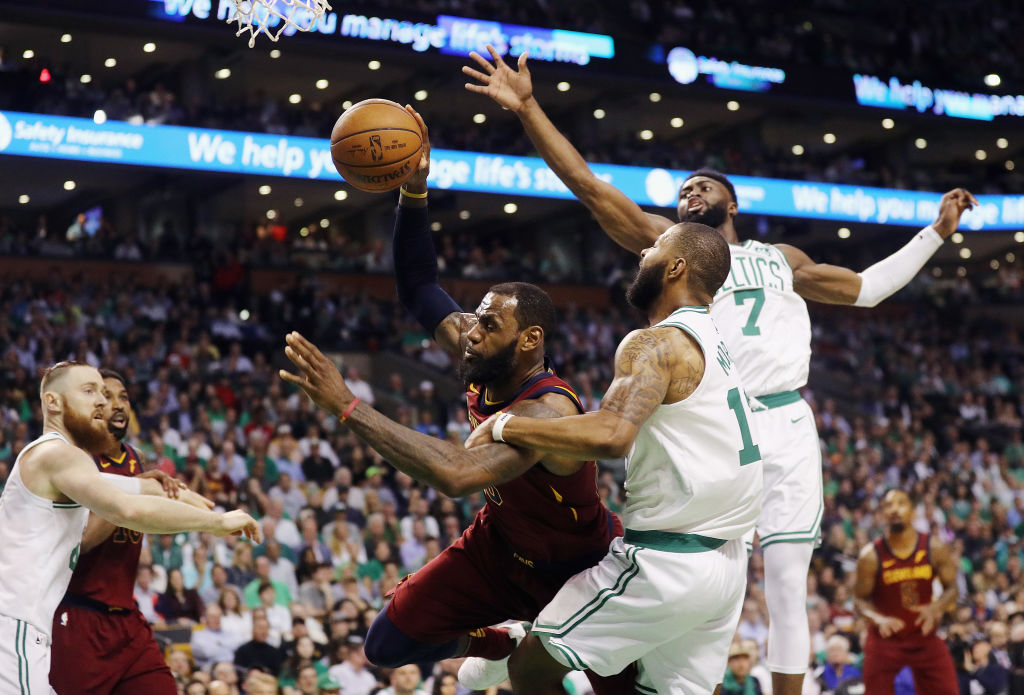 Marcus Morris #13 of the Boston Celtics fouls LeBron James #23 of the Cleveland Cavaliers in the first half during Game Two of the 2018 NBA Eastern Conference Finals at TD Garden on May 15, 2018 in Boston, Massachusetts. (Photo by Maddie Meyer/Getty Images)