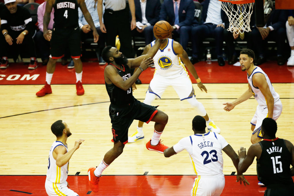 James Harden #13 of the Houston Rockets shoots against the Golden State Warriors in the second half of Game Two of the Western Conference Finals of the 2018 NBA Playoffs at Toyota Center on May 16, 2018 in Houston, Texas. (Photo by Tim Warner/Getty Images)