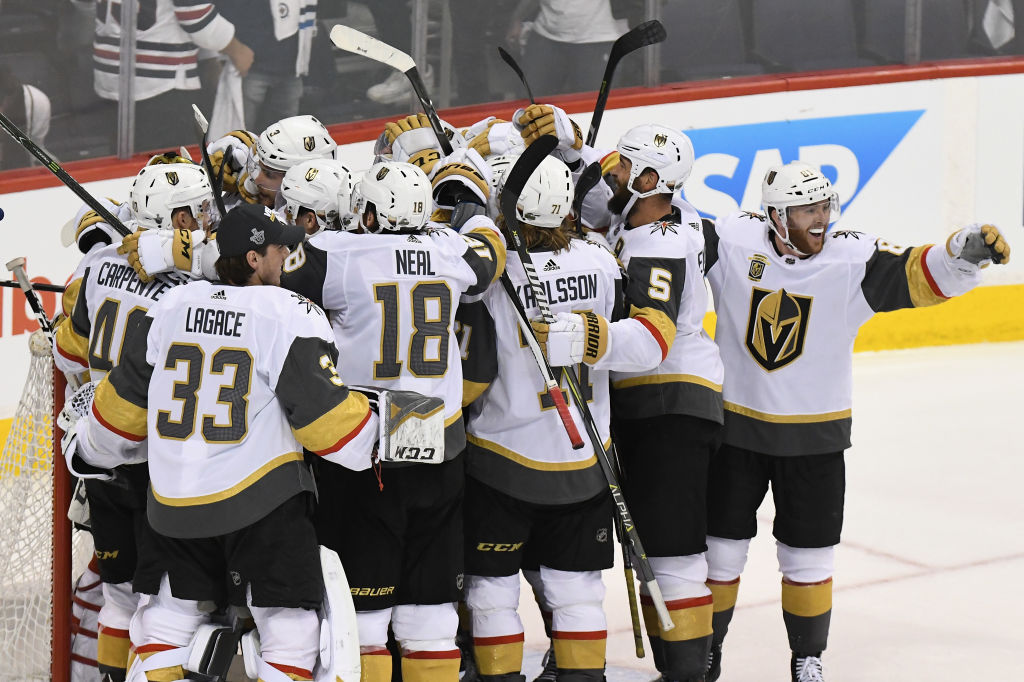 The Vegas Golden Knights celebrate defeating the Winnipeg Jets 2-1 in Game Five of the Western Conference Finals to advance to the 2018 NHL Stanley Cup Final at Bell MTS Place on May 20, 2018 in Winnipeg, Canada.  (Photo by David Lipnowski/Getty Images)