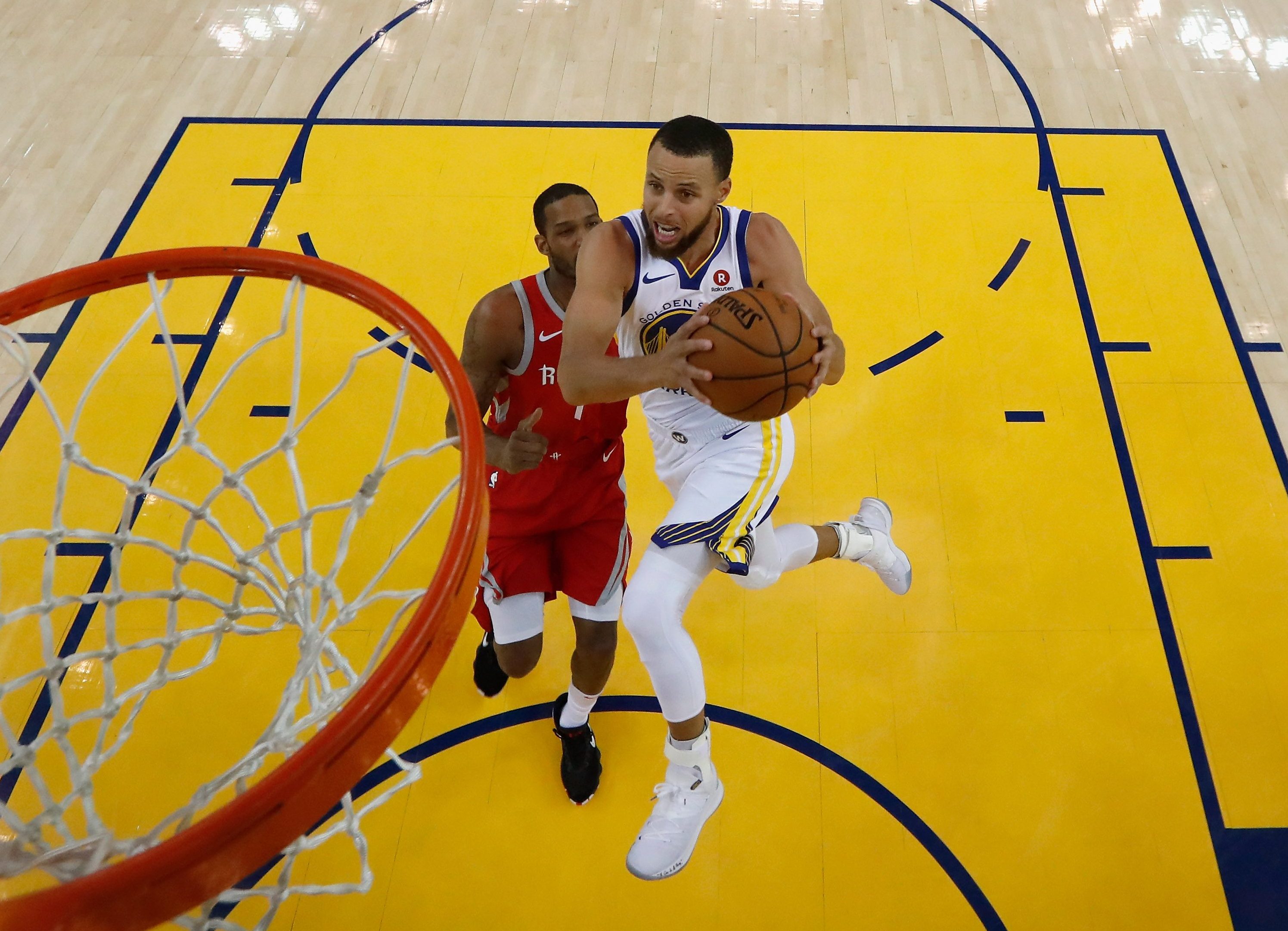 Stephen Curry #30 of the Golden State Warriors goes up for a shot on Trevor Ariza #1 of the Houston Rockets during Game 6 of the Western Conference Finals at ORACLE Arena on May 26, 2018 in Oakland, California. (Photo by John G. Mabanglo-Pool/Getty Images)
