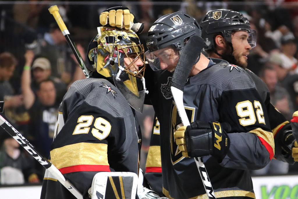 Marc-Andre Fleury #29 and Tomas Nosek #92 of the Vegas Golden Knights celebrate their teams 6-4 win over the Washington Capitals in Game One of the 2018 NHL Stanley Cup Final at T-Mobile Arena on May 28, 2018 in Las Vegas, Nevada.  (Photo by Bruce Bennett/Getty Images)