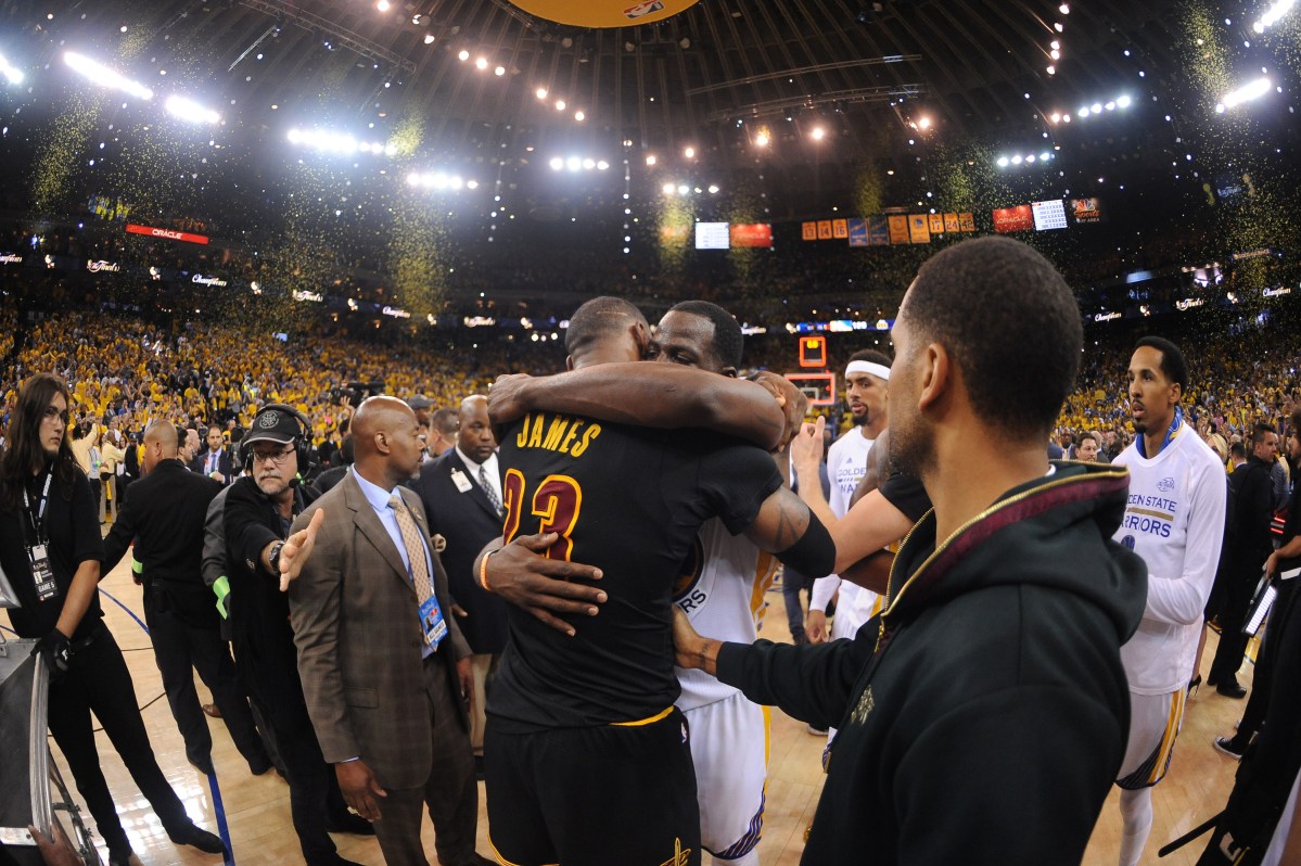 LeBron James of the Cleveland Cavaliers and Draymond Green of the Golden State Warriors embrace after Game Five of the 2017 NBA Finals on June 12, 2017 at Oracle Arena in Oakland, California. Their teams meet again in the NBA Finals for the fourth straight season. (Noah Graham/NBAE via Getty Images)
