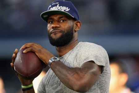 NBA superstar LeBron James gets to give football a try at AT&T Stadium on September 8, 2013 in Arlington, Texas. (Getty Images)