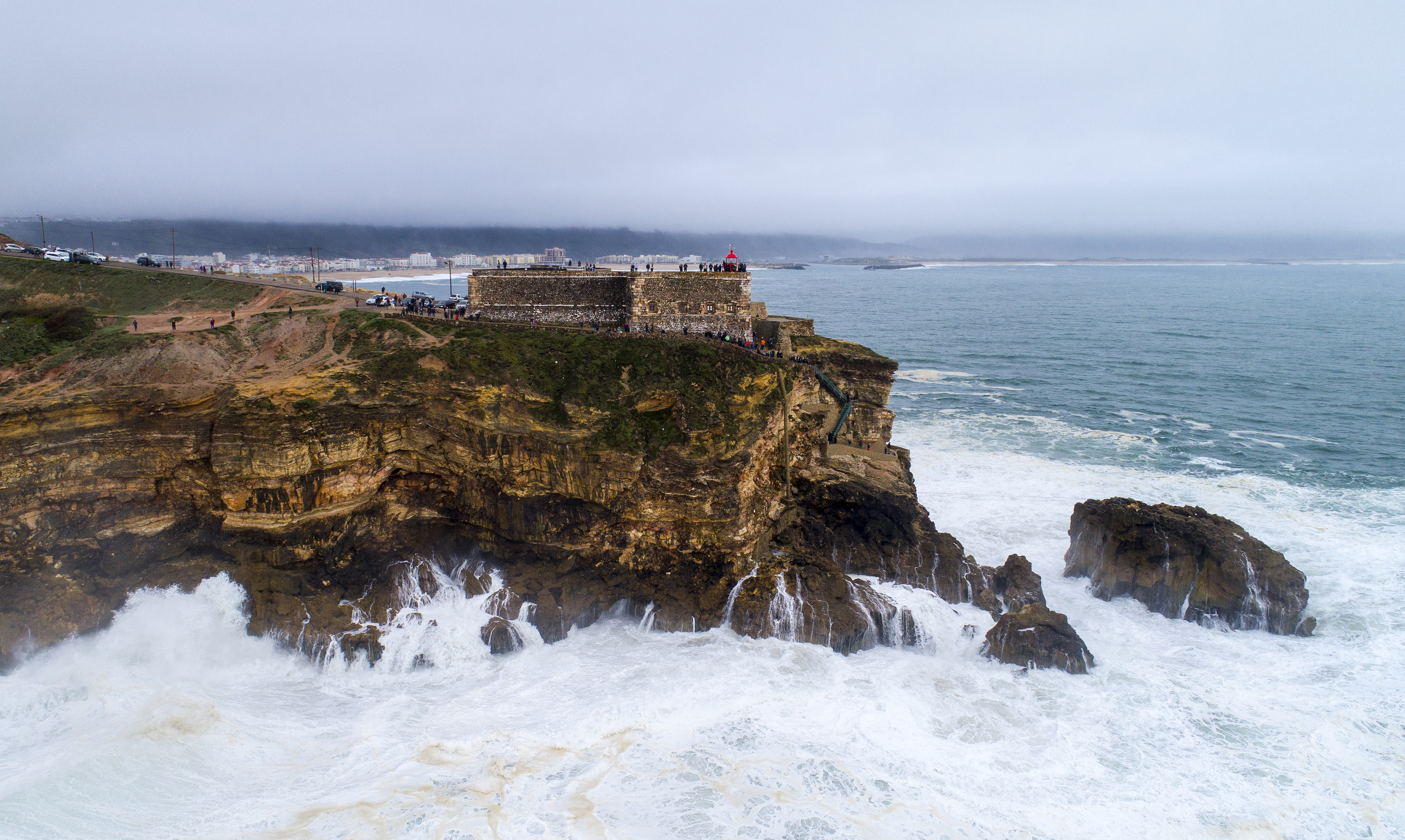 General view of Nazare lighthouse during a surf session at Praia do Norte on January 3, 2018 in Nazare, Portugal. (Octavio Passos/Getty Images)