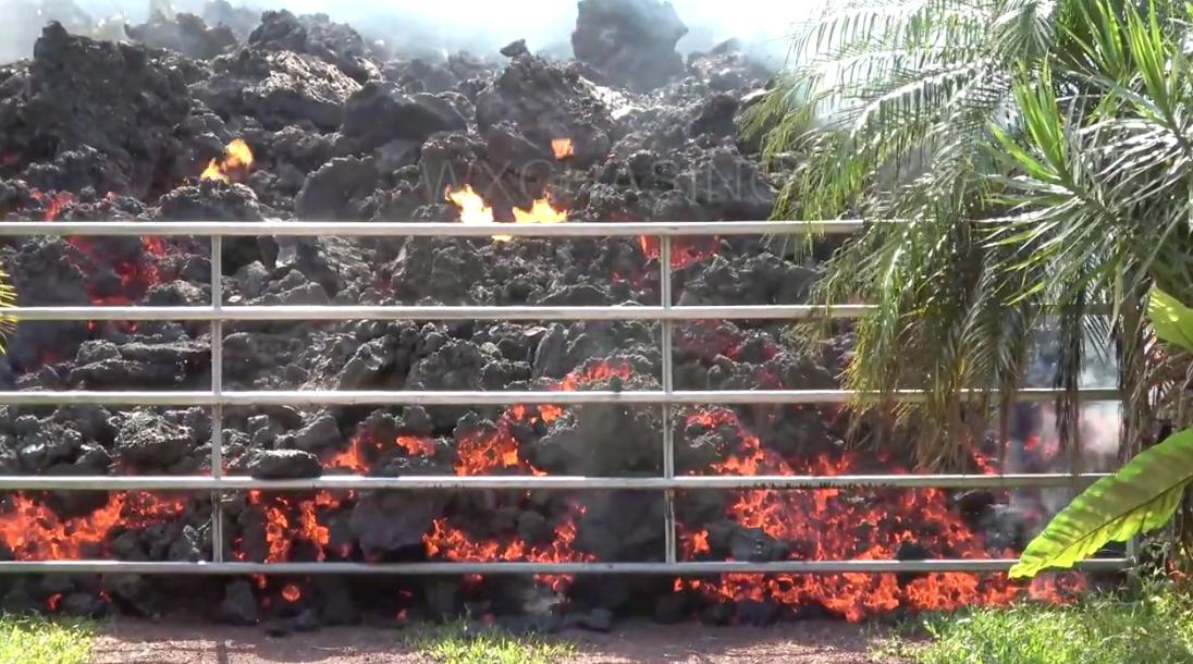 A still shot of lava destroying a gate on Hawaii's Big Island (Facebook video)