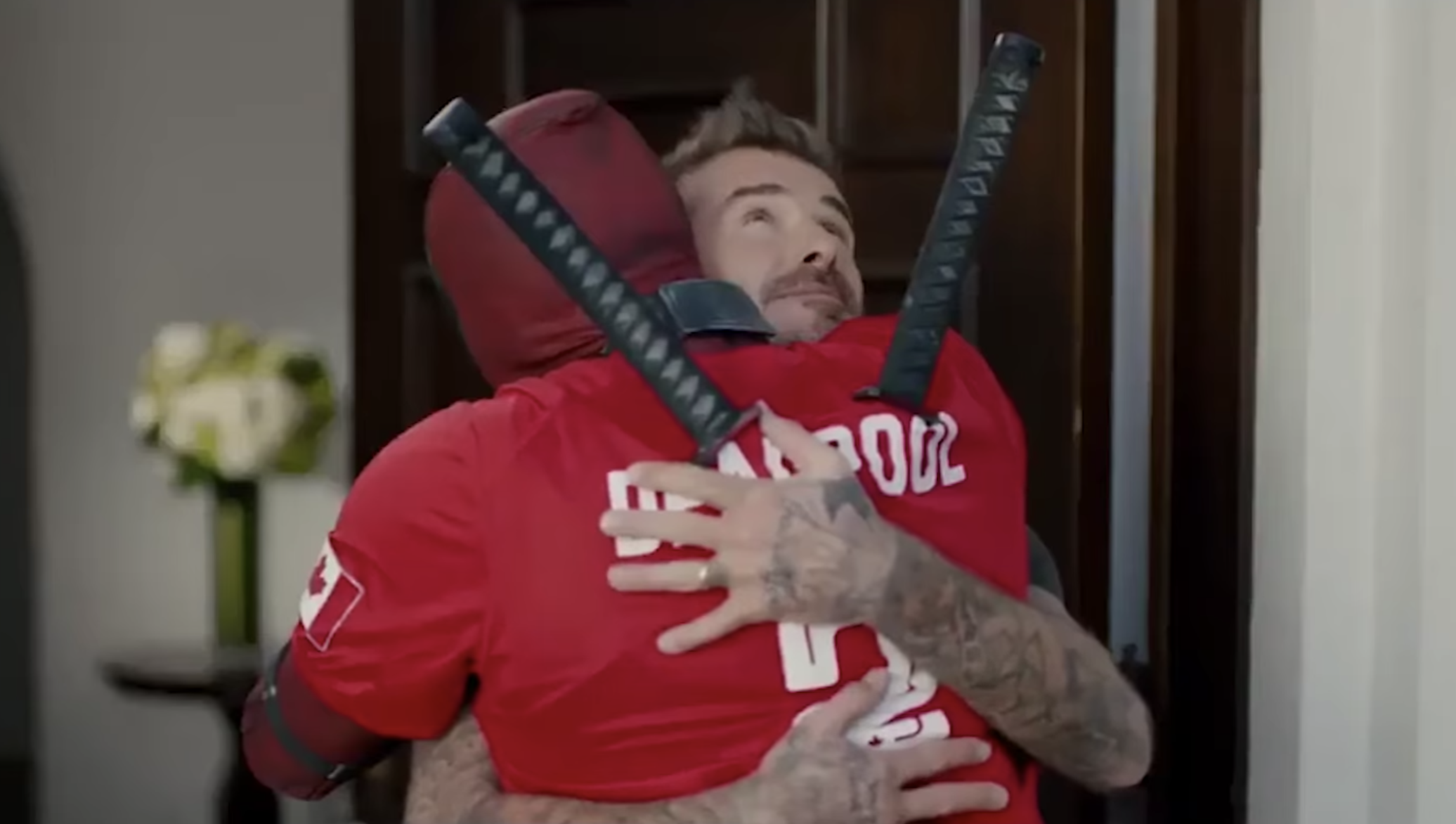 David Beckham and Deadpool Hug It Out in New Trailer