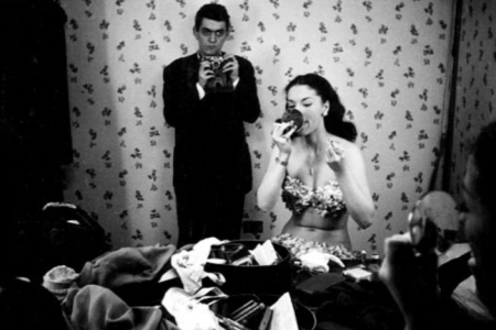 Stanley Kubrick was a LOOK magazine photographer when he caught himself in the mirror of Rosemary Williams, a showgirl, in 1949. LOOK Magazine Collection, Library of Congress, Prints & Photographs Division. (Courtesy of Wikimedia Commons)