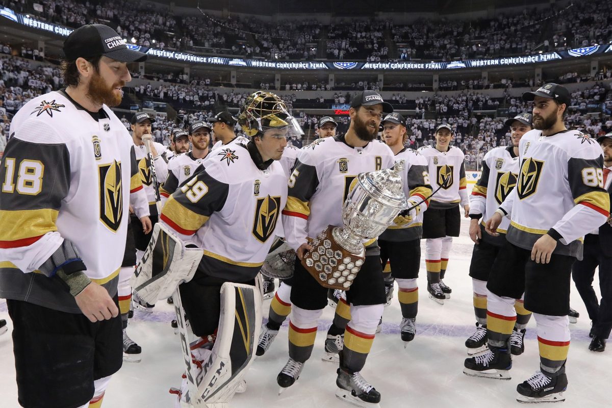 Deryk Engelland of the NHL expansion team Vegas Golden Knights celebrates with the Clarence S. Campbell Bowl after defeating the Winnipeg Jets 2-1 in Game Five of the Western Conference Finals to advance to the 2018 NHL Stanley Cup Final at Bell MTS Place on May 20, 2018 in Winnipeg, Canada. (Jason Halstead/Getty Images)