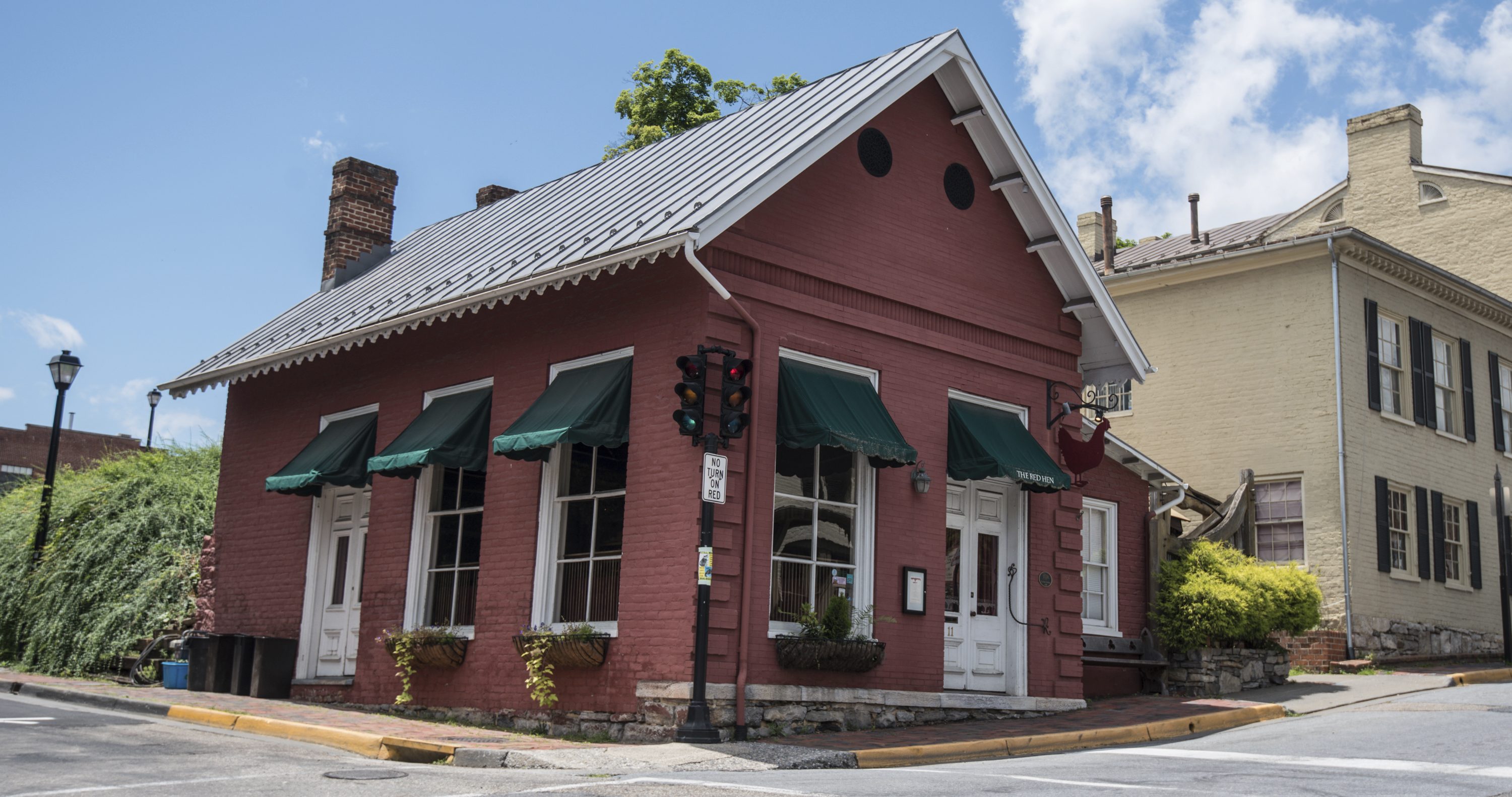 This Saturday, June 23, 2018 photo shows the Red Hen Restaurant in downtown Lexington, Va. White House press secretary Sarah Huckabee Sanders said Saturday in a tweet that she was booted from the Virginia restaurant because she works for President Donald Trump.  (AP Photo/Daniel Lin)