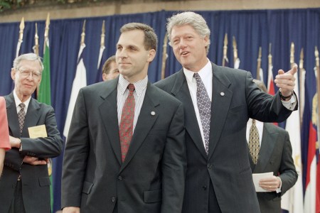 President Bill Clinton talks to FBI Director Louis Freeh during Freeh's swearing ceremony as director at FBI Headquarters in Washington on Sept. 1, 1993. (AP Photo/Wilfredo Lee)