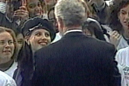 In this image taken from video, Monica Lewinsky (wearing beret) smiles at President Clinton as he greets well-wishers at a White House lawn party in Washington Nov. 6, 1996. (AP Photo/APTV)