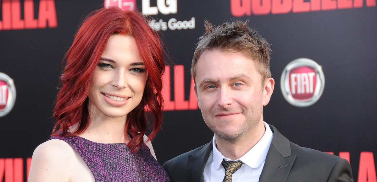TV personality/comic Chris Hardwick (R) and actress Chloe Dykstra arrive at the Los Angeles premiere of 'Godzilla' held on May 8, 2014 at Dolby Theatre in Hollywood, California.  (Photo by Barry King/FilmMagic)