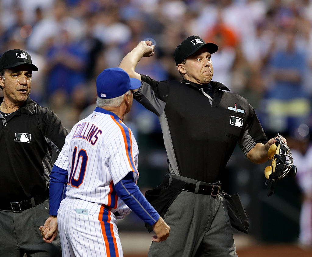 Home plate umpire Adam Hamari throws out manager Terry Collins #10 of the New York Mets after Collins argued the call of starting pitcher Noah Syndergaard getting ejected in the third inning at Citi Field on May 28, 2016 in the Flushing neighborhood of the Queens borough of New York City.  (Photo by Elsa/Getty Images)