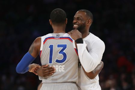 Paul George #13 of the Indiana Pacers hugs LeBron James #23 of the Cleveland Cavaliers during the 2017 NBA All-Star Game at Smoothie King Center on February 19, 2017 in New Orleans, Louisiana. NOTE TO USER: User expressly acknowledges and agrees that, by downloading and/or using this photograph, user is consenting to the terms and conditions of the Getty Images License Agreement. (Photo by Ronald Martinez/Getty Images)