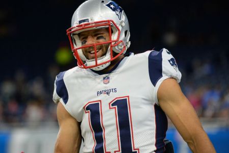 Wide receiver Julian Edelman #11 of the New England Patriots smiles as he walks toward the sideline prior to a preseason game on August 25, 2017 against the Detroit Lions at Ford Field in Detroit, Michigan. New England won 30-28. (Photo by: 2017 Nick Cammett/Diamond Images/Getty Images)