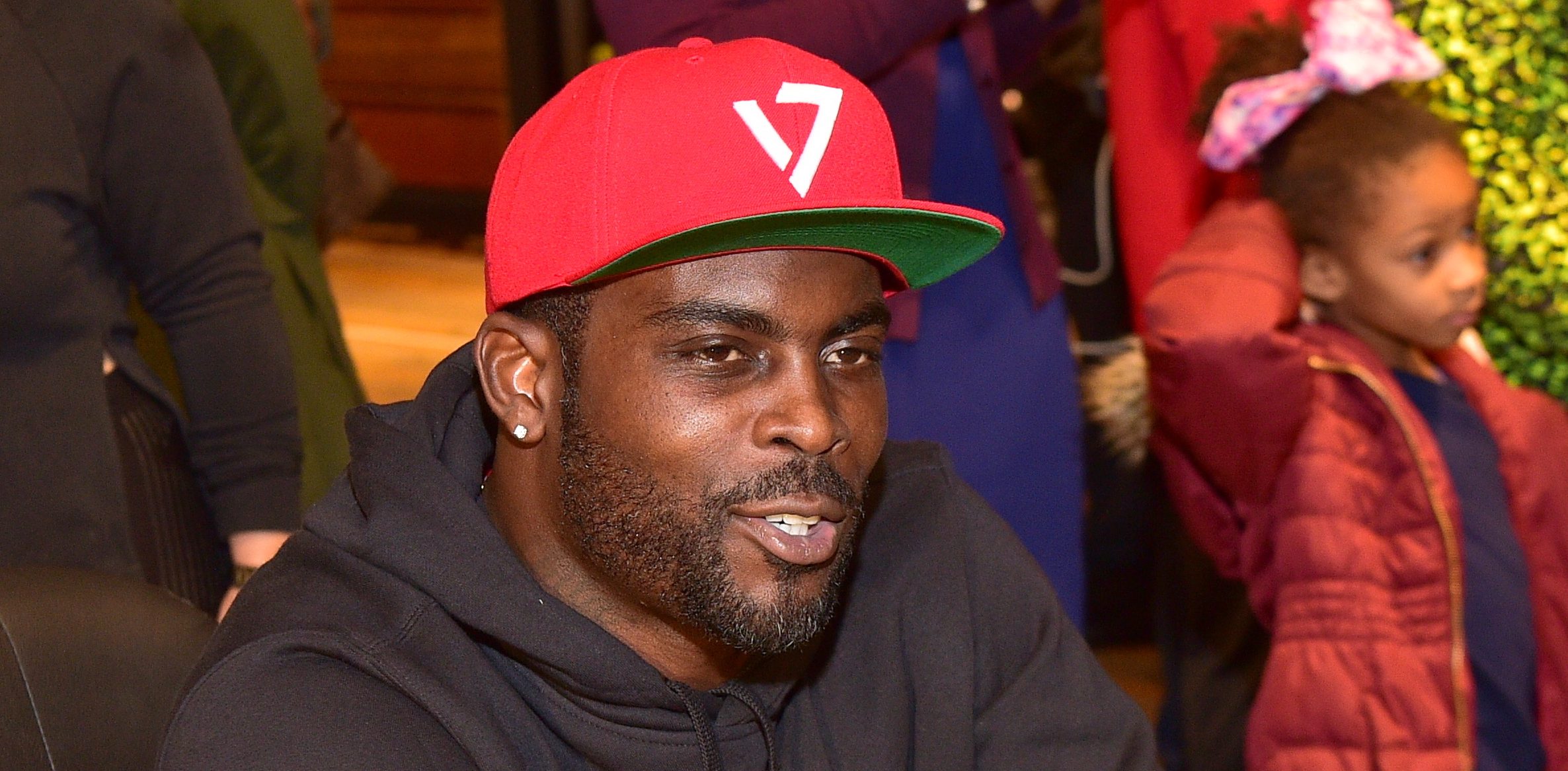 Michael Vick attends Michael Vick Charity Shoe Give aways at Nike on December 20, 2017 in Atlanta, Georgia. (Photo by Prince Williams/WireImage)