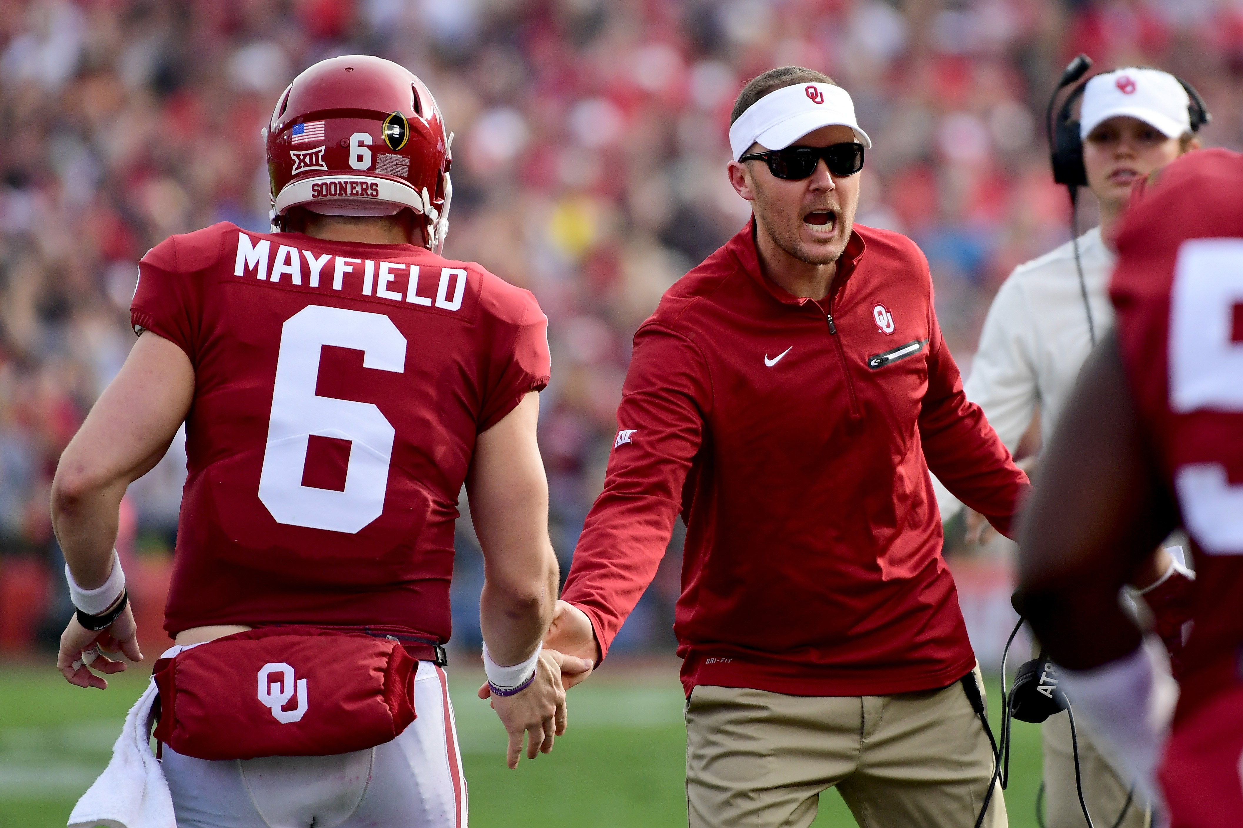 Baker Mayfield #6 of the Oklahoma Sooners shakes hands with head coach Lincoln Riley during the 2018 College Football Playoff Semifinal Game against the Georgia Bulldogs at the Rose Bowl Game presented by Northwestern Mutual at the Rose Bowl on January 1, 2018 in Pasadena, California. (Photo by Harry How/Getty Images)