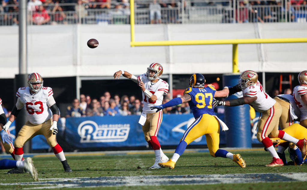 Jimmy Garoppolo #10 of the San Francisco 49ers passes during the game against the Los Angeles Rams at Los Angeles Memorial Coliseum on December 31, 2017 in Los Angeles, California. The 49ers defeated the Rams 34-13. (Photo by Michael Zagaris/San Francisco 49ers/Getty Images)