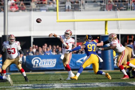 Jimmy Garoppolo #10 of the San Francisco 49ers passes during the game against the Los Angeles Rams at Los Angeles Memorial Coliseum on December 31, 2017 in Los Angeles, California. The 49ers defeated the Rams 34-13. (Photo by Michael Zagaris/San Francisco 49ers/Getty Images)
