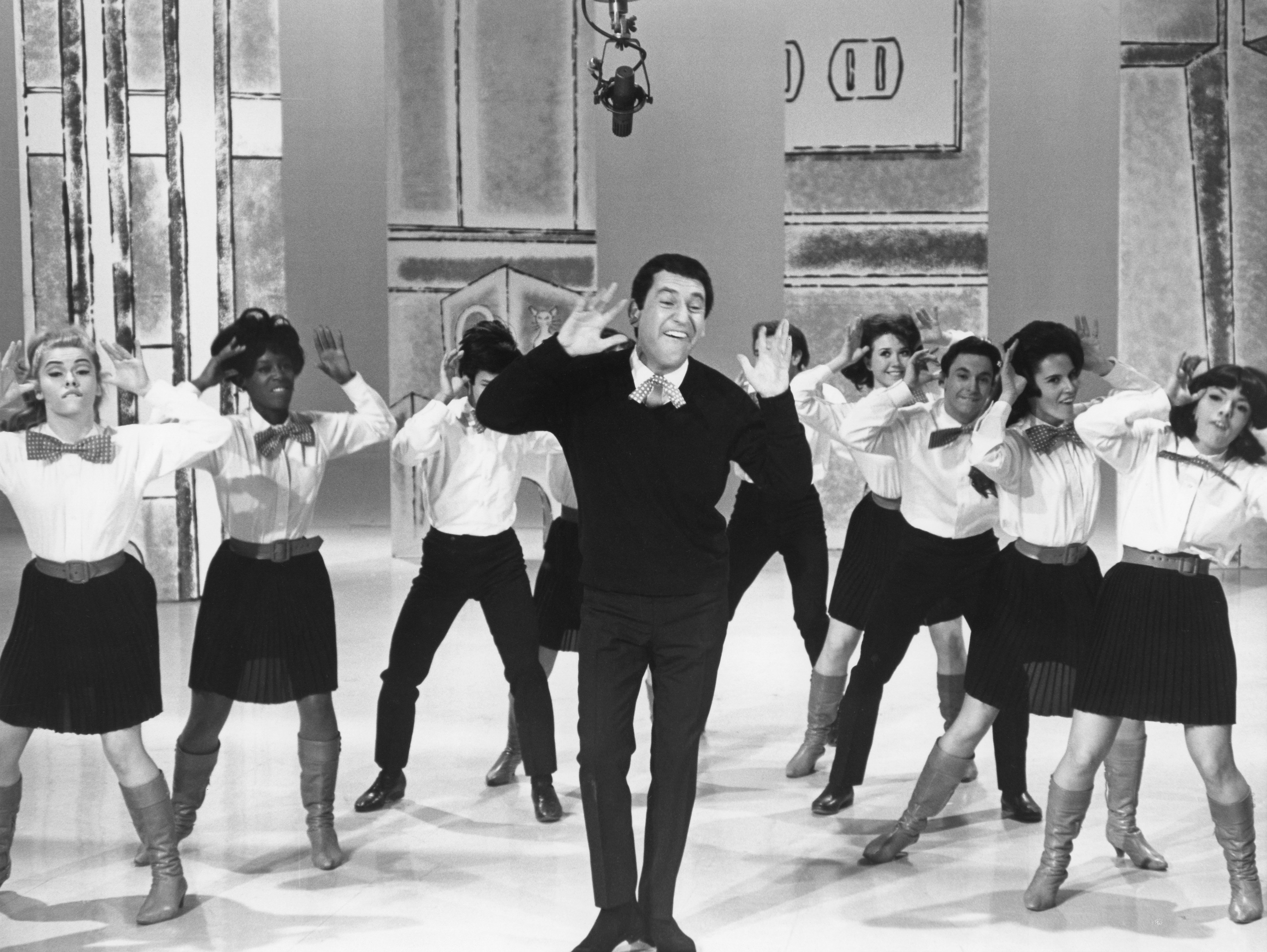 Comedian Soupy Sales performs his hit single 'The Mouse' on the set of his TV show circa 1961 in Los Angeles, California. (Photo by Michael Ochs Archives/Getty Images)