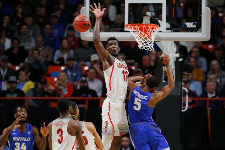 Deandre Ayton #13 of the Arizona Wildcats battles for the ball against CJ Massinburg #5 of the Buffalo Bulls in the second half during the first round of the 2018 NCAA Men's Basketball Tournament at Taco Bell Arena on March 15, 2018 in Boise, Idaho.  (Photo by Kevin C. Cox/Getty Images)