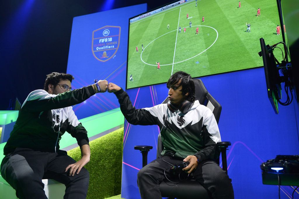 Khalid Aloufii aka THEROYAL and Mosaad Aldossary aka MSDOSSARY7 of Falcons eSport react during the FIFA eClub World Cup - Day 2 on May 20, 2018 in Paris, France.  (Photo by Aurelien Meunier - FIFA/FIFA via Getty Images)