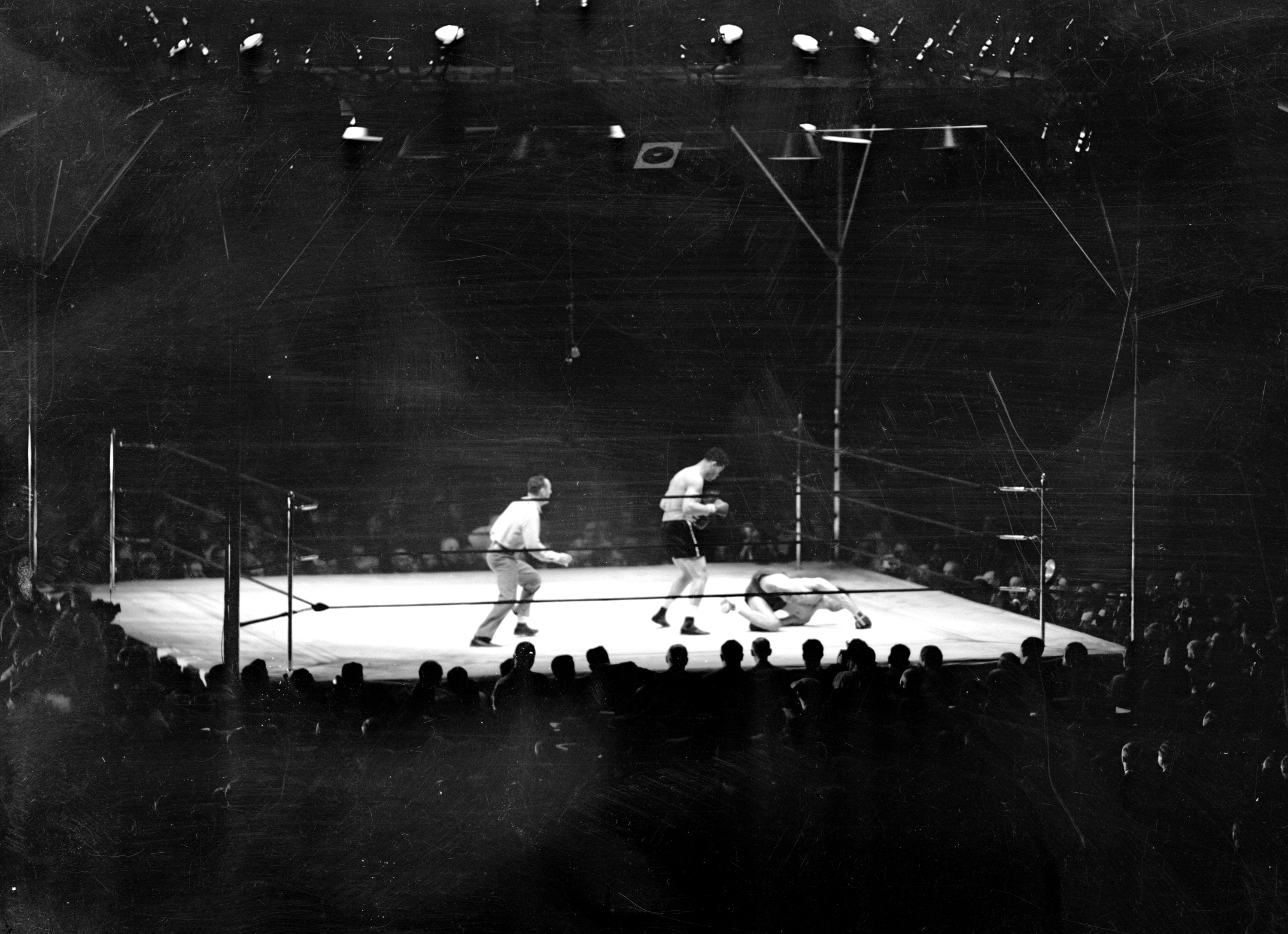 Joe Louis vs Max Schmeling., Both hands on the canvas, Max tries to get his bearings. No dice. He was back in his native Germany as far as last night's fight was concerned. Joe's terrific punching was too much. (NY Daily News Archive via Getty Images)