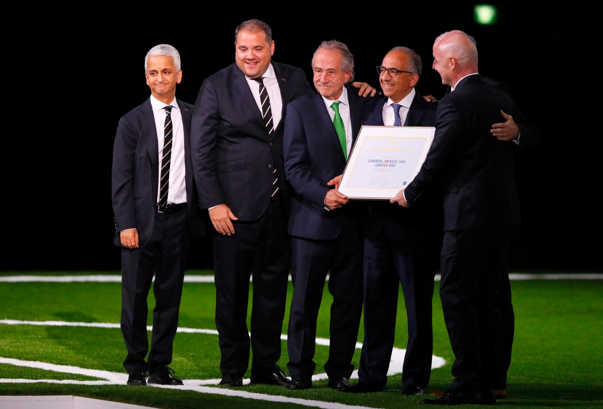 FIFA president Gianni Infantino (r) poses with the United 2026 bid (Canada, Mexico, US) officials: Left-Right Sunil Gulati president of the United States Soccer Federation, CONCACAF President Victor Montagliani, president of the Mexican Football Association Decio de Maria Serrano, president of the United States Football Association Carlos Cordeiro and Steve Reed president of the Canadian Soccer Association (hidden) after the announcement of the host for the 2026 FIFA World Cup went to United 2026 bid during the 68th FIFA Congress at Moscow's Expocentre on June 13, 2018 in Moscow, Russia. (Kevin C. Cox/Getty Images)