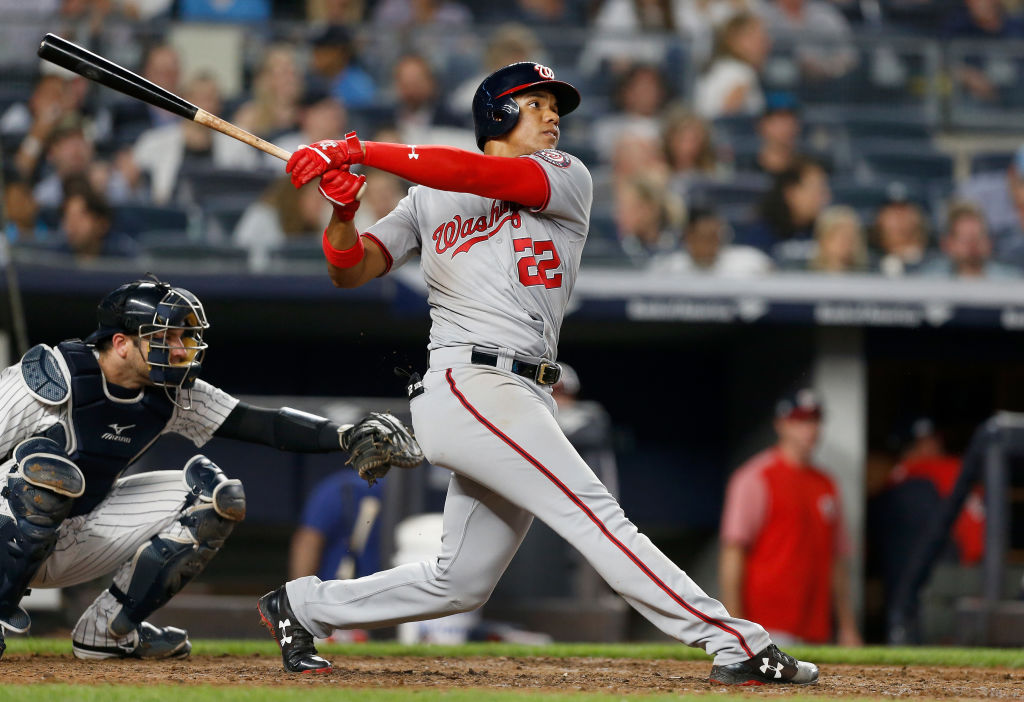 Juan Soto #22 of the Washington Nationals follows through on his seventh inning home run against the New York Yankees at Yankee Stadium on June 13, 2018 in the Bronx borough of New York City. The Nationals defeated the Yankees 5-4.  (Photo by Jim McIsaac/Getty Images)