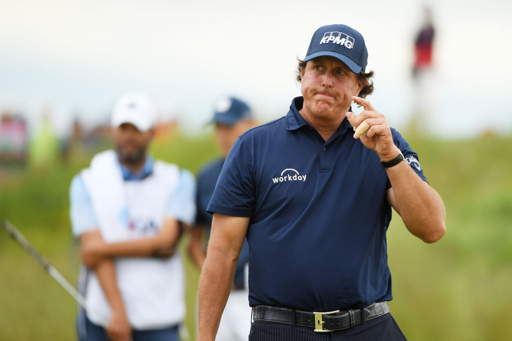 Phil Mickelson of the United States reacts on the 11th green during the second round of the 2018 U.S. Open at Shinnecock Hills Golf Club on June 15, 2018 in Southampton, New York.  (Photo by Ross Kinnaird/Getty Images)