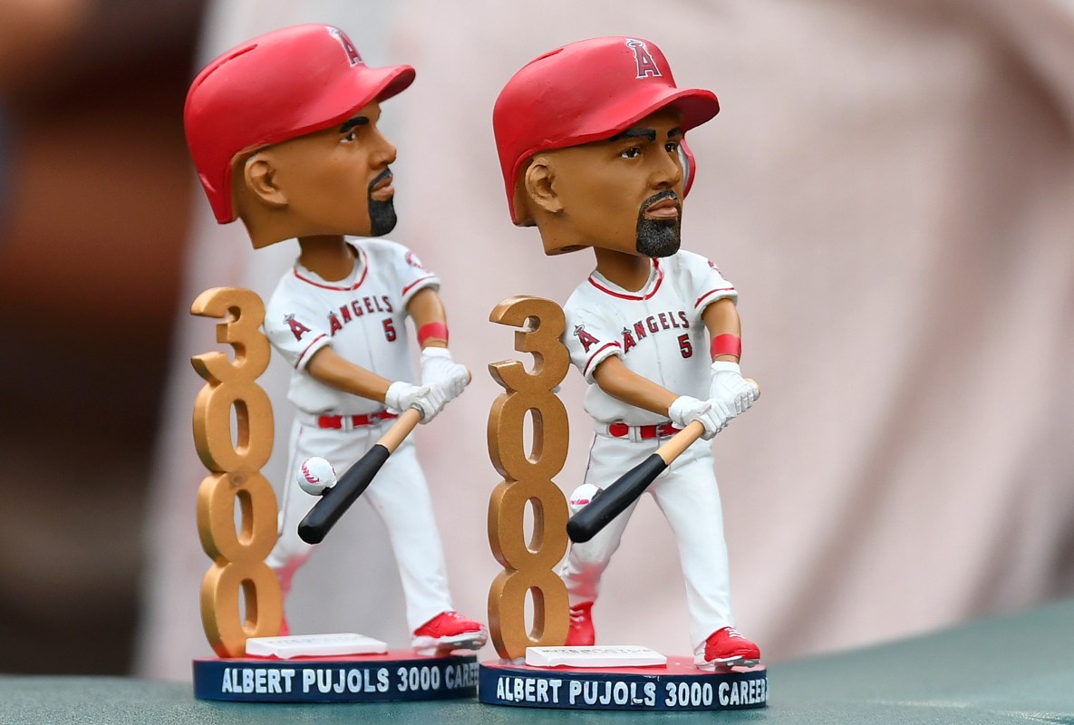 A detailed view of a Albert Pujols #5 of the Los Angeles Angels of Anaheim bobble head doll that celebrates his 3000 hits seen in the stands prior to the start of the game between the Los Angeles Angels of Anaheim and Oakland Athletics at the Oakland Alameda Coliseum on June 15, 2018 in Oakland, California.  (Photo by Thearon W. Henderson/Getty Images)