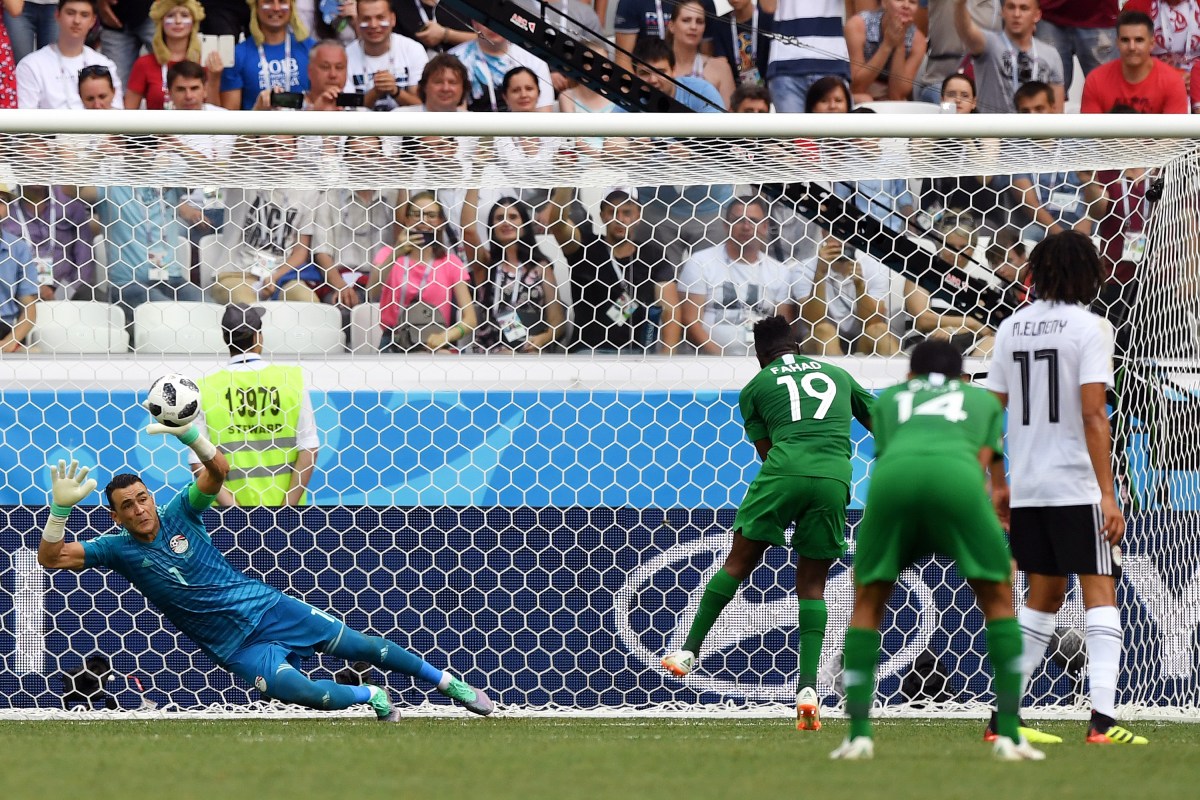 Essam El Hadary of Egypt saves a penalty from Fahad Almuwallad of Saudi Arabia during the 2018 FIFA World Cup Russia group A match between Saudia Arabia and Egypt at Volgograd Arena on June 25, 2018 in Volgograd, Russia.  (Photo by Shaun Botterill/Getty Images)