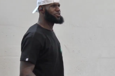 Screenshot of LeBron James watching his son play hoops. (VIA @SLAM_HS on Instagram)