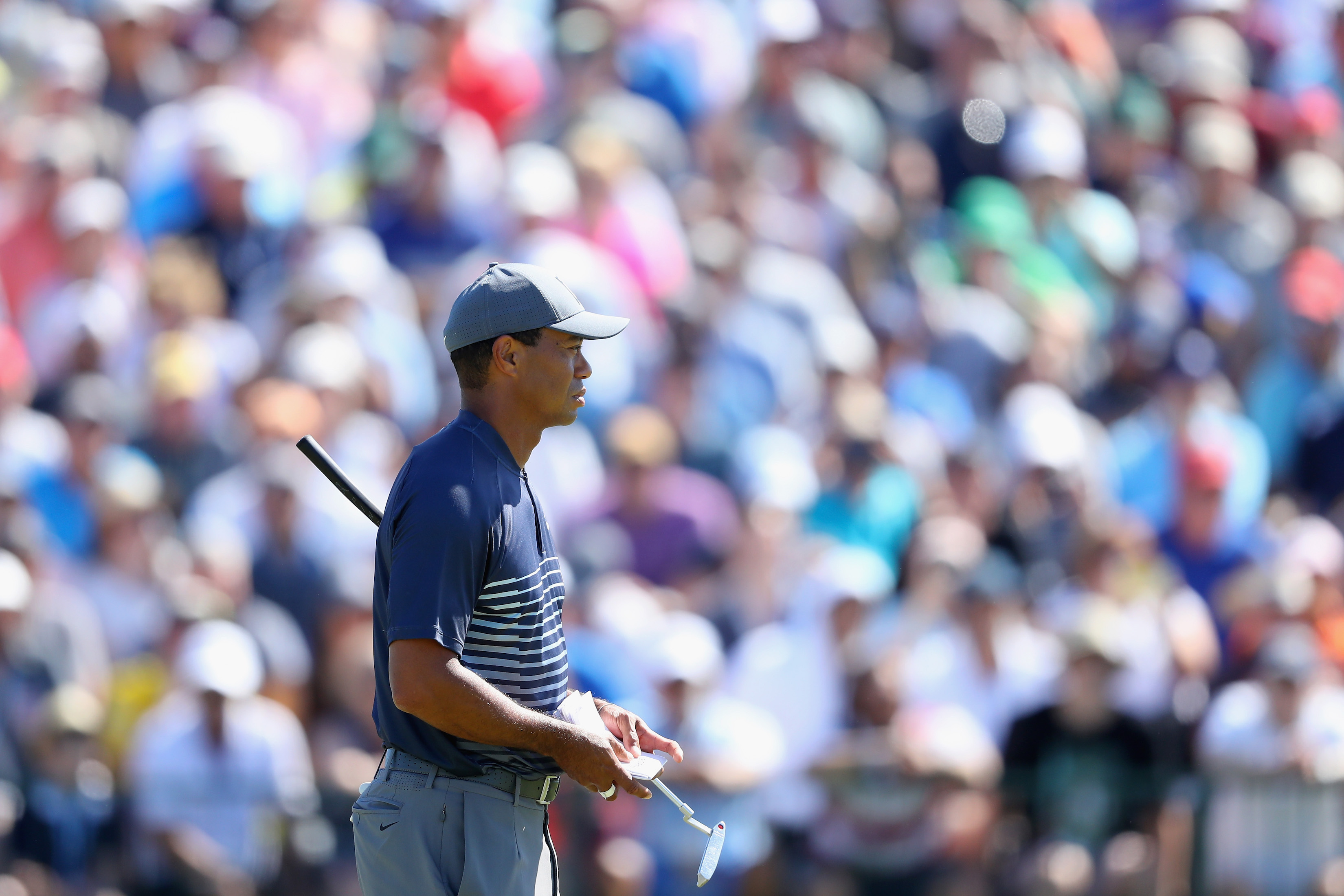 Tiger Woods of the United States checks his yardage book on the seventh green during the first round of the 2018 U.S. Open at Shinnecock Hills Golf Club on June 14, 2018 in Southampton, New York. (Photo by Warren Little/Getty Images)