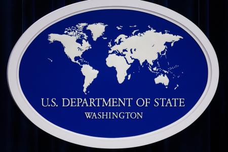 The US Department of State logo is displayed inside the media briefing room 01 November 2007 at the US Department of State in Washington, DC.    AFP PHOTO/Paul J. Richards (Photo credit should read PAUL J. RICHARDS/AFP/Getty Images)