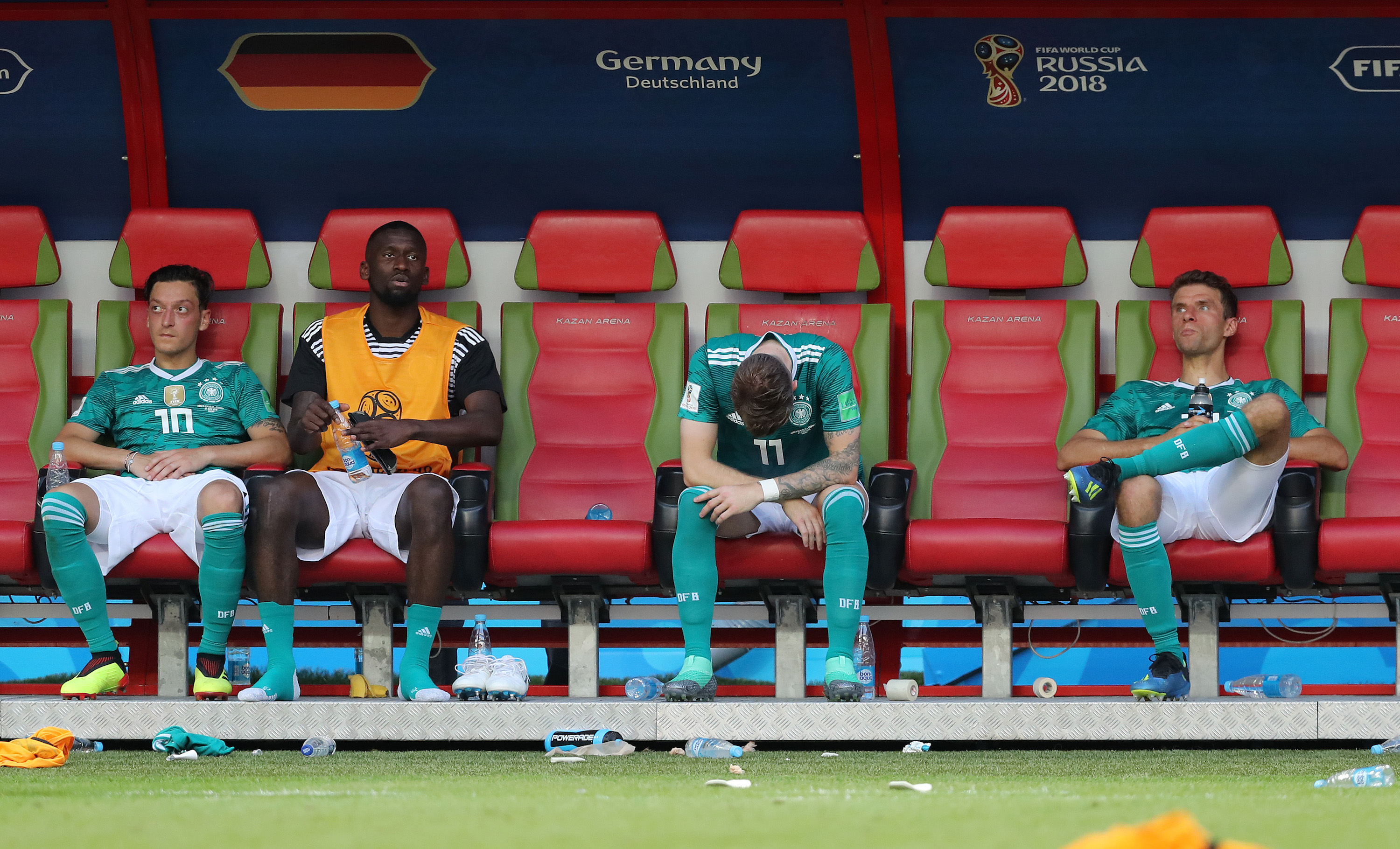 Mesut Ozil, Antonio Ruediger, Marco Reus, and Thomas Mueller of Germany react following defending champion Germany's loss during the 2018 FIFA World Cup Russia Group F match between Korea Republic and Germany at Kazan Arena on June 27, 2018 in Kazan, Russia. (Stefan Matzke - sampics/Corbis via Getty Images)