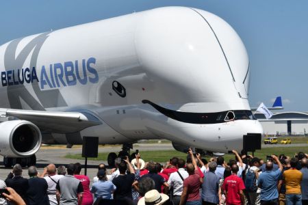 An Airbus 'BelugaXL' aircraft taxis in front of Airbus employees at Toulouse-Blagnac on July 19, 2018 (Photo by ERIC CABANIS / AFP)        