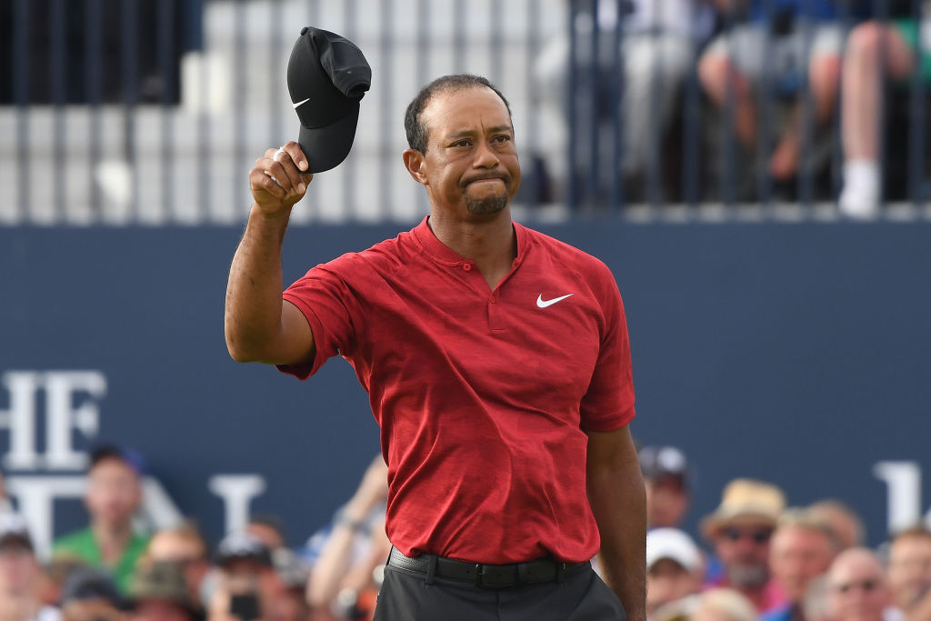 Tiger Woods of the United States acknowledges the crowd on the 18th green during the final round of the 147th Open Championship at Carnoustie Golf Club on July 22, 2018 in Carnoustie, Scotland. (Photo by Harry How/Getty Images)