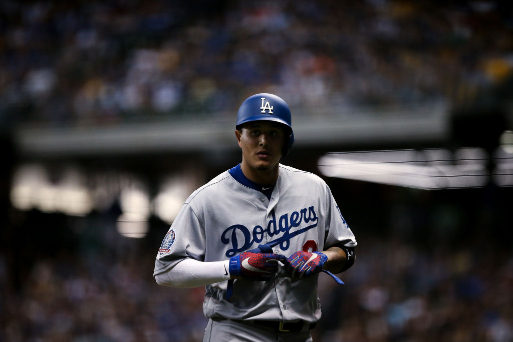 Manny Machado #8 of the Los Angeles Dodgers walks across the field in the seventh inning against the Milwaukee Brewers at Miller Park on July 21, 2018 in Milwaukee, Wisconsin. (Photo by Dylan Buell/Getty Images)