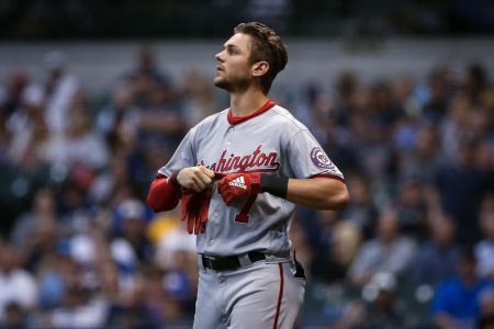 Trea Turner #7 of the Washington Nationals walks across the field in the fourth inning against the Milwaukee Brewers at Miller Park on July 23, 2018 in Milwaukee, Wisconsin. (Photo by Dylan Buell/Getty Images)