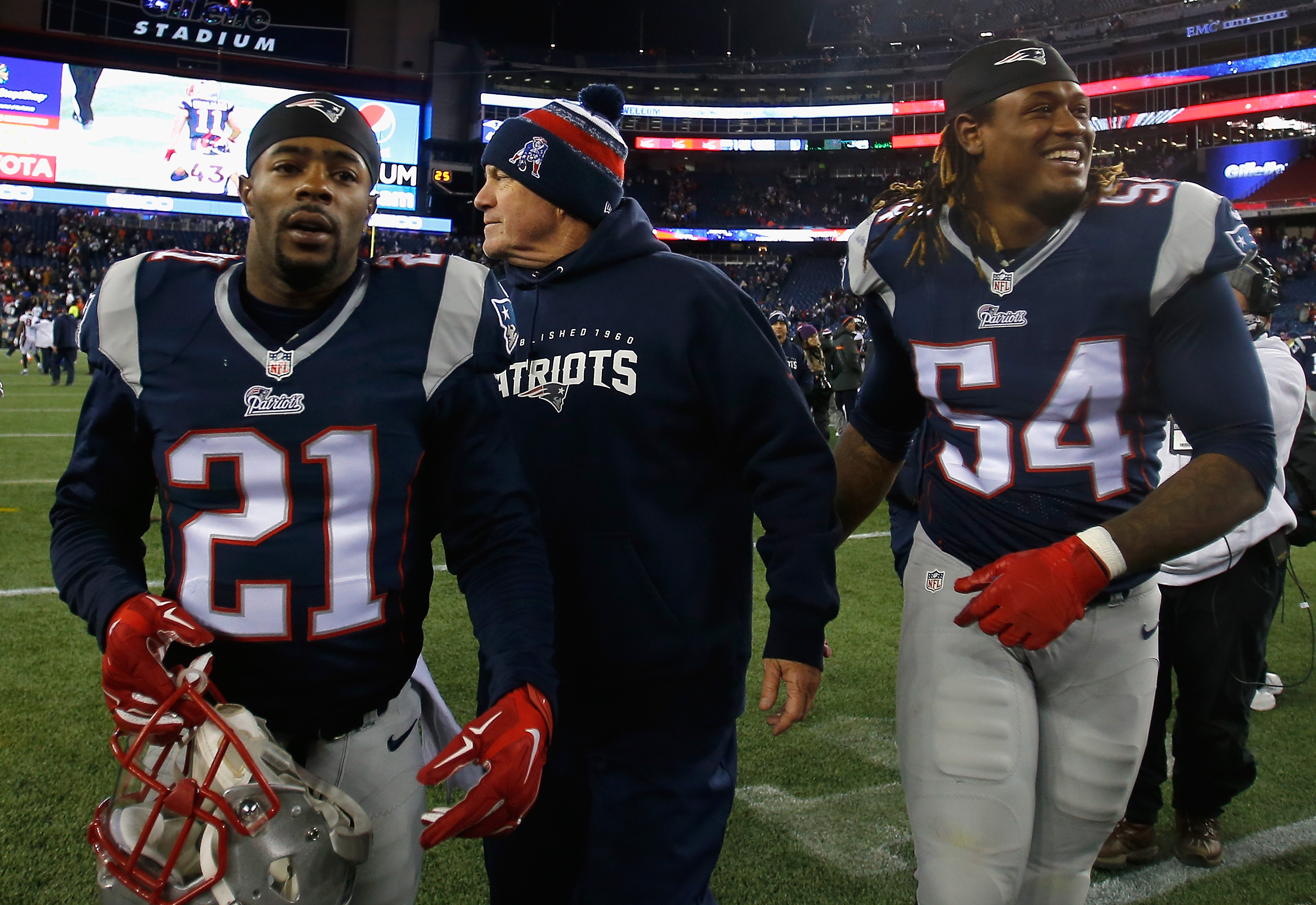 Head coach Bill Belichick of the New England Patriots reacts alongside Malcolm Butler #21 and Akeem Ayers #54 after defeating the Denver Broncos at Gillette Stadium on November 2, 2014 in Foxboro, Massachusetts. (Photo by Jim Rogash/Getty Images)