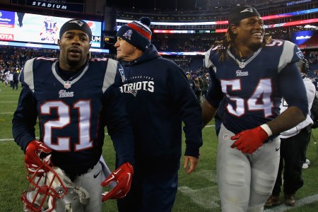 Head coach Bill Belichick of the New England Patriots reacts alongside Malcolm Butler #21 and Akeem Ayers #54 after defeating the Denver Broncos at Gillette Stadium on November 2, 2014 in Foxboro, Massachusetts.  (Photo by Jim Rogash/Getty Images)
