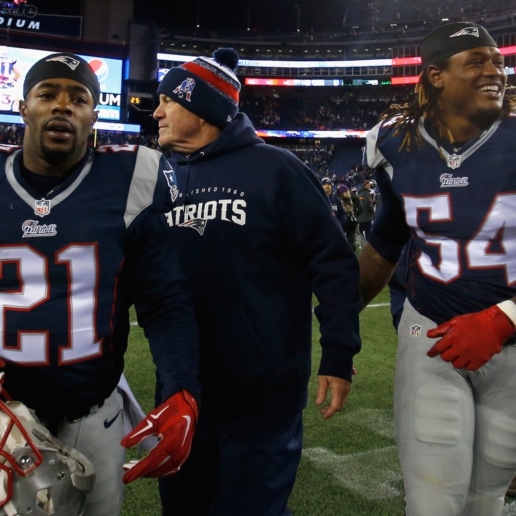 Head coach Bill Belichick of the New England Patriots reacts alongside Malcolm Butler #21 and Akeem Ayers #54 after defeating the Denver Broncos at Gillette Stadium on November 2, 2014 in Foxboro, Massachusetts.  (Photo by Jim Rogash/Getty Images)