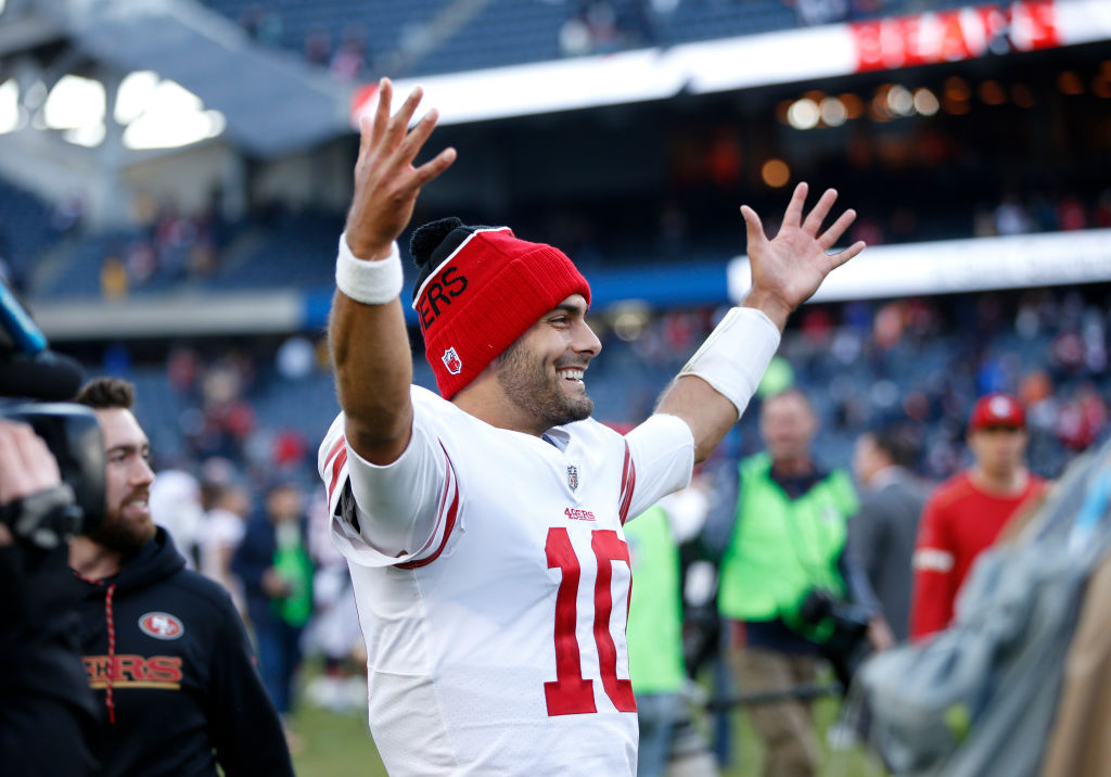 Quarterback Jimmy Garoppolo #10 of the San Francisco 49ers reacts after the 49ers defeated the Chicago Bears 15-14 at Soldier Field on December 3, 2017 in Chicago, Illinois. (Photo by Joe Robbins/Getty Images)