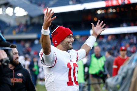 Quarterback Jimmy Garoppolo #10 of the San Francisco 49ers reacts after the 49ers defeated the Chicago Bears 15-14 at Soldier Field on December 3, 2017 in Chicago, Illinois. (Photo by Joe Robbins/Getty Images)