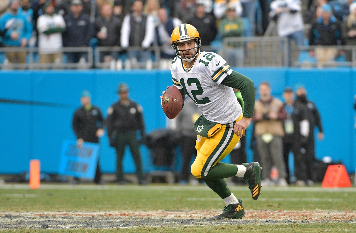 Aaron Rodgers #12 of the Green Bay Packers during their game against the Carolina Panthers at Bank of America Stadium on December 17, 2017 in Charlotte, North Carolina. The Panthers won 31-24.  (Photo by Grant Halverson/Getty Images)