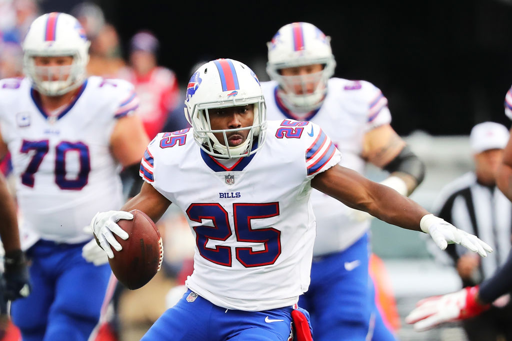 LeSean McCoy #25 of the Buffalo Bills carries the ball during the second quarter of a game against the New England Patriots at Gillette Stadium on December 24, 2017 in Foxboro, Massachusetts. (Photo by Adam Glanzman/Getty Images)