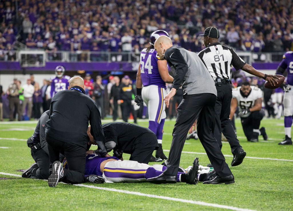 Andrew Sendejo #34 of the Minnesota Vikings is evaluated by trainers on the field after suffering an injury in the third quarter of the NFC Divisional Playoff game against the New Orleans Saints on January 14, 2018 at U.S. Bank Stadium in Minneapolis, Minnesota. Sendejo was later ruled out for the game with a concussion. (Photo by Adam Bettcher/Getty Images)