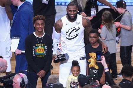 LeBron James Jr., LeBron James #23, Zhuri James and Bryce Maximus James pose for a photo with the All-Star Game MVP trophy during the NBA All-Star Game 2018 at Staples Center on February 18, 2018 in Los Angeles, California.  (Photo by Jayne Kamin-Oncea/Getty Images)