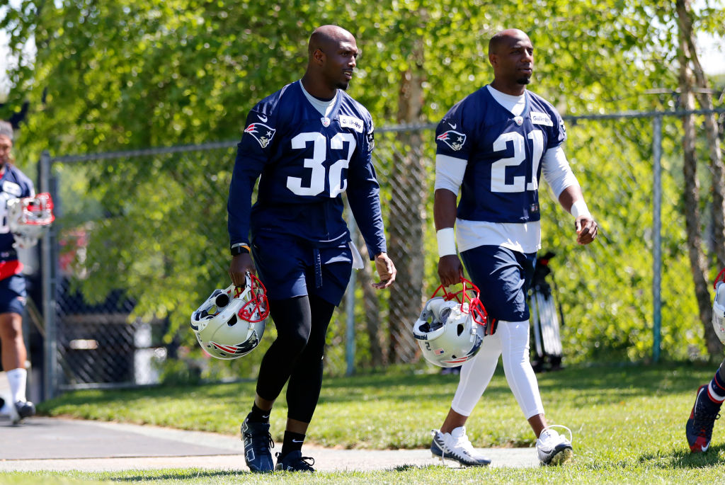 New England Patriots defensive back Devin McCourty (32)  and New England Patriots defensive back Duron Harmon (21) during New England Patriots OTA on May 31, 2018, at the Patriots Practice Facility in Foxborough, Massachusetts. (Photo by Fred Kfoury III/Icon Sportswire via Getty Images)